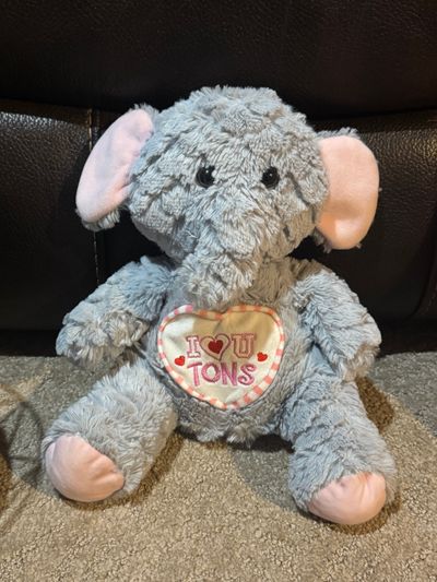 Elephant that says I love you tons on the front Elephant that says I love you tons on the front