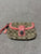 Coach Wristlet with salmon color trim. Back zip. EUC