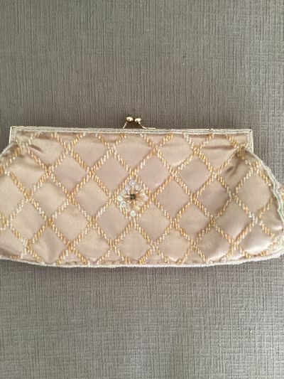Fellini Gold beaded bag no handles