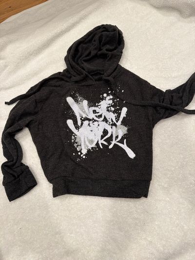 Revelation Cozy hoodie says New York 5T/5