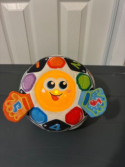VTech Bright Lights Soccer Ball Plush Kick, pass, shake soccer ball,motion-activated sounds some wear