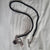 unknown Lia Sophia braided black cord necklace w/silver tone heart charms