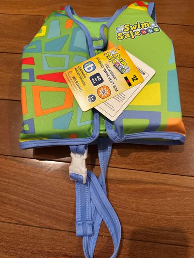 Brand new swim, safe fabric, swim vest Size small medium