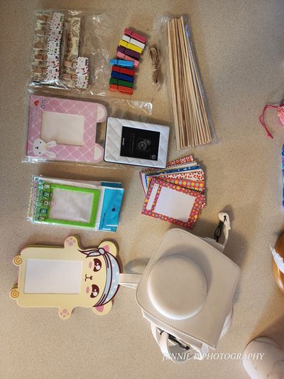 Fuji Instanx Camera case With Frame stickers and clips and twine to hang pictures up