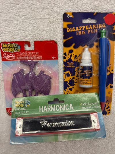 Brand New grow dinosaur, harmonica and prank pen Brand New grow dinosaur, harmonica and prank pen