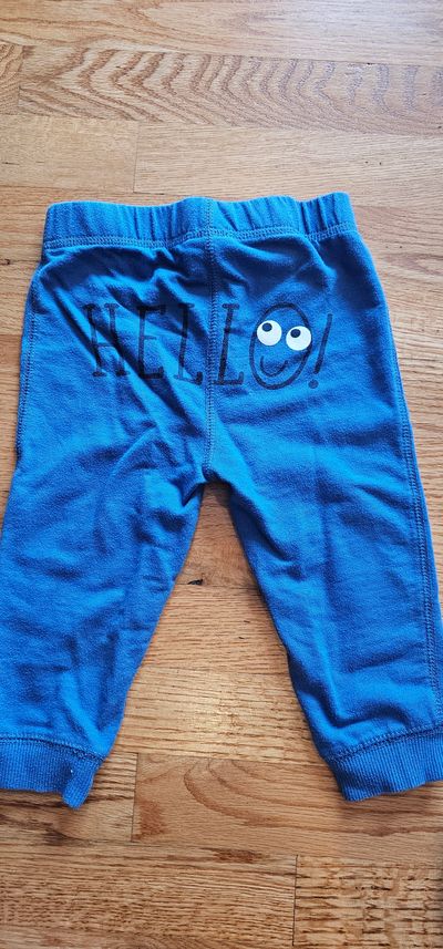 First Impression Like new graphic sweat pants w/ smile face prints at the back 18 Months