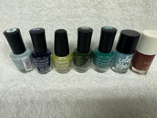 Brand New Nail polishes. Set of 7. Green has spill Green has spill on it from another bottle