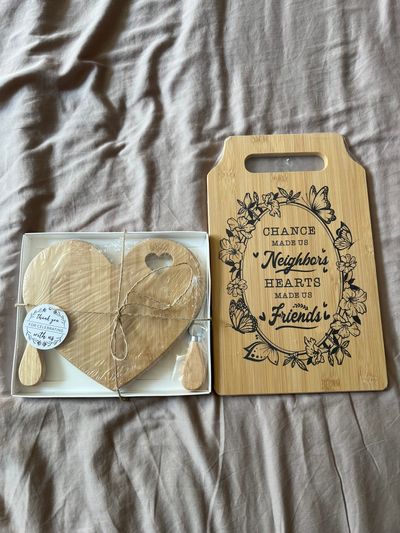 Unknown NEW two wooden cutting boards, one has a cheese cutter