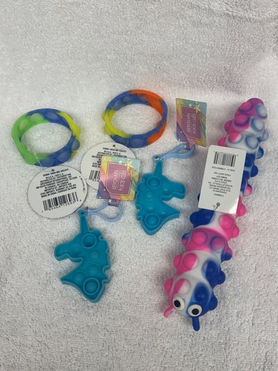 Brand New pop bracelets, keychains and critter Brand New pop bracelets, keychains and critter