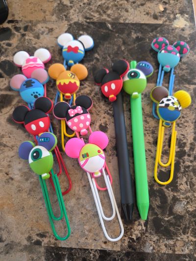 Lot of Disney Pend and paper clips
