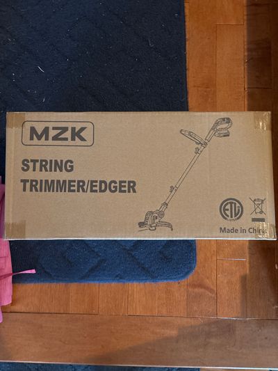 NEW - string Trimmer- Edger In sealed box