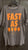 NIKE GREY W/ ORANGE WRITING Men's - M