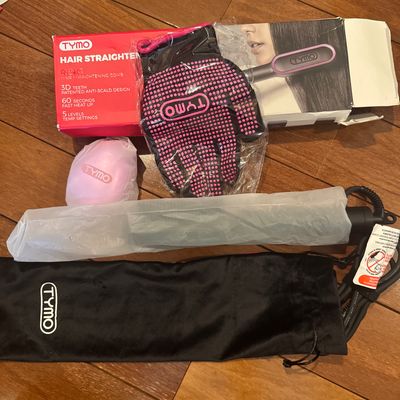 Brand new Tymo ring hair, straightener comb Brush five temperature setting retail $50 box has some light wear