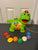 V-Tech Chomp & Count Dino Dino recognizes 8 brightly colored food pieces, music, pull-along