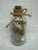 Beach sand and shells in a seahorse bottle Beach sand and shells in a seahorse bottle