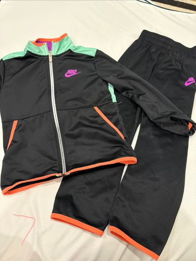 Nike Track suit tag says size 7 runs a bit small 7-8