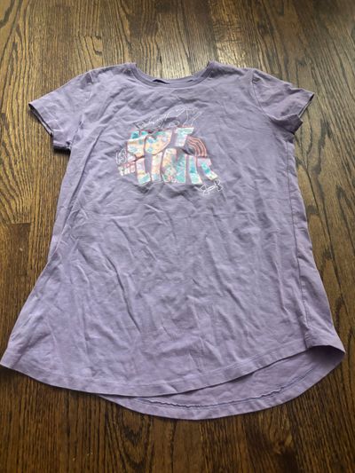 Under Armour size, large purple T-shirt  10-12