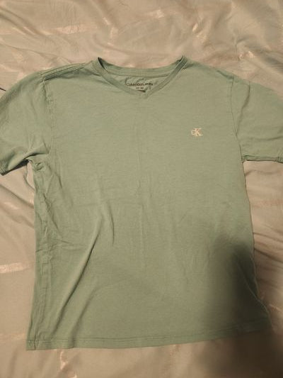 Calvin Klein Turquoise color.  Very nice spring color.. 6T/6