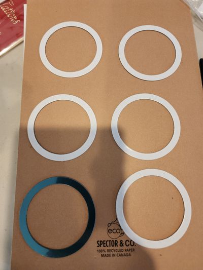 magnetic rings  to add MagSafe compatibility magnetic rings designed to add MagSafe compatibility to smartphon