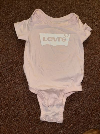 Levi's pink with white levi's logo short sleeve onesie 12 Months