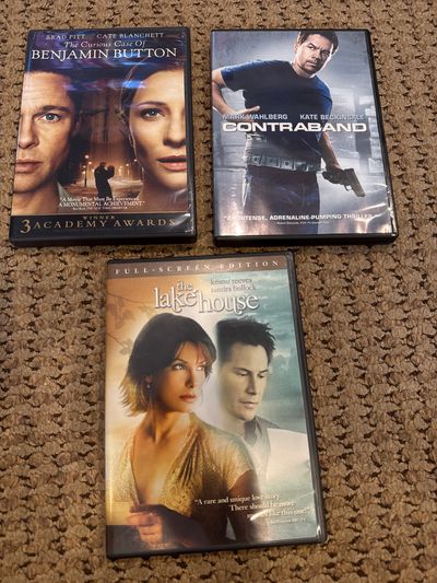 Three DVDs, Lakehouse, Benjamin button and contrab dvd