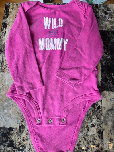 Carters long sleeved onesie  24 Months