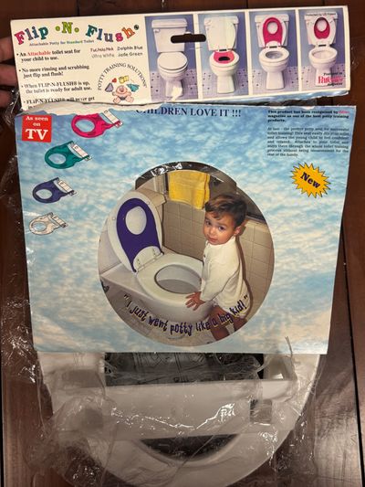 Brand New but package is ripped. Hardware included As seen on TV Flip N Go potty seat