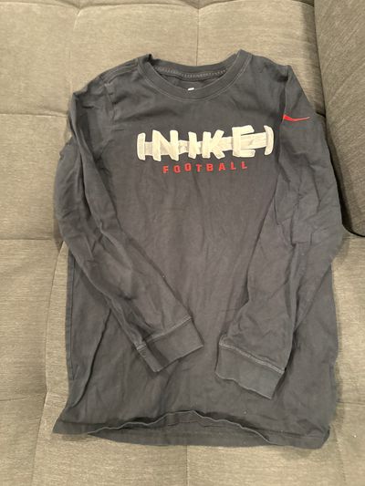 Nike Nike black long sleeve football tee with white and red lettering 7-8