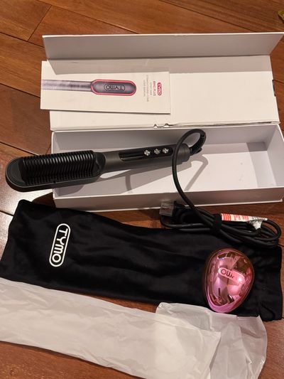 Brand new Tymo ring plus ionic hair, straightening Comb retails for over $55 box looks very good no glove
