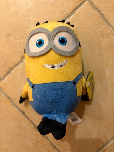 Brand new with tag minion stuffy From new minion and monster movie
