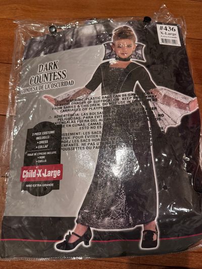Brand new dark countess, two piece costume Kids extra-large fit size 14 to 16 dress and collar