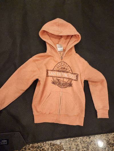 peach-colored zip-up hoodie peach-colored zip-up hoodie 5T/5