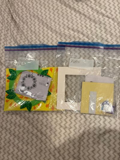 Unknown 2 craft kits- foam sunflower wreath and sand art picture frame