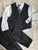 Nautica New with tags. Black suit with tie. Cotton and polyester 18 Months