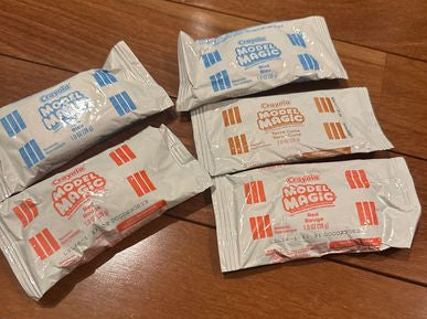 Brand new 5 packs of Crayola model magic 1 ounce Packages, blue orange and brown