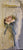 N/A An elegant pen wrapped with ribbon with floral accents on top