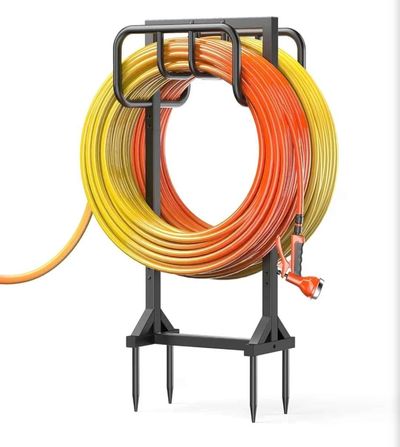 Garden hose stand that goes in the ground. brand new black metal. no hose included