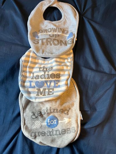 Three baby bibs barely used Light blue and grey