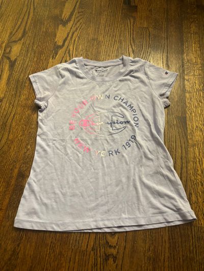 Champion, purple size, large short sleeve T-shirt  10-12