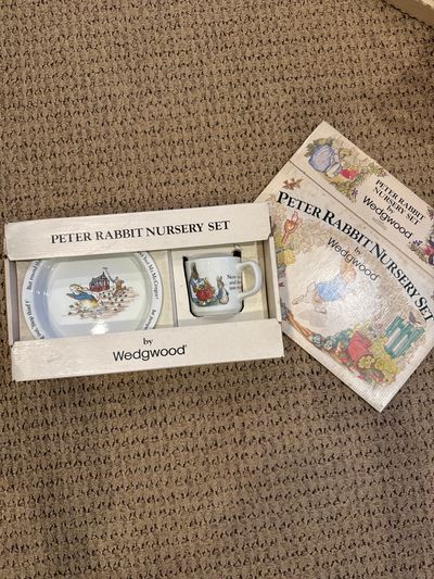 Brand new Peter rabbit three piece Wedgewood Collectors item set online for over $100 box has aging and wear