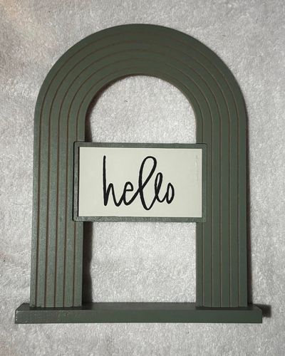 Brand New Home decor. Says hello and is green Brand New Home decor. Says hello and is a green rainbow  11 inch
