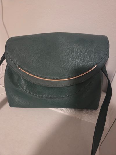 Lauren Conrad Crossbody bag Slight wear and tear. Beautiful Hunter green crossbody bag