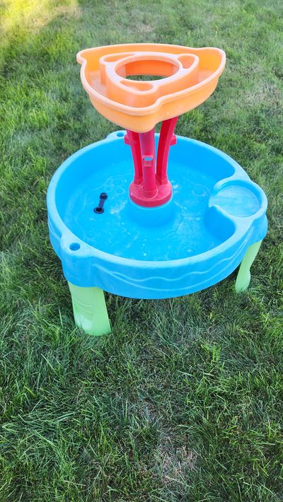 WATER TABLE has some marks of bleach
