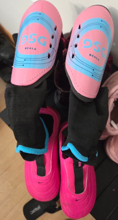 Nike and Dicks Sporting Goods Cleats size 9 and youth medium shin guards. Worn just 3times 9 (Lil' Kid)