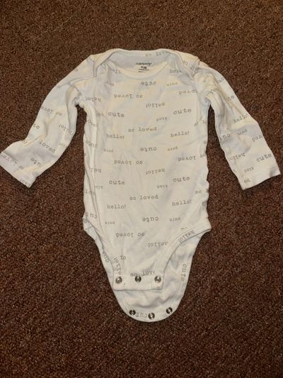 Carter's white long sleeve onesie 9 Months