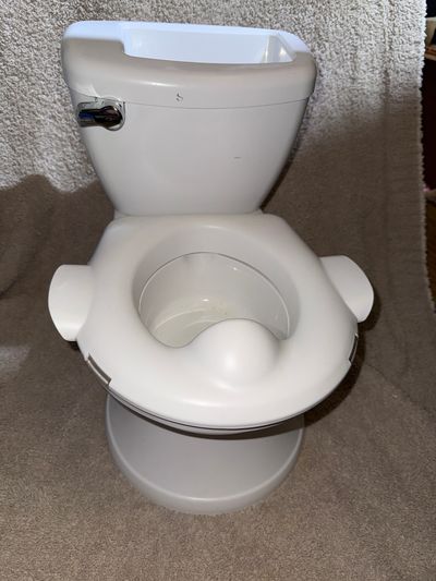 SUMMER White potty chair with flush sound and book holder