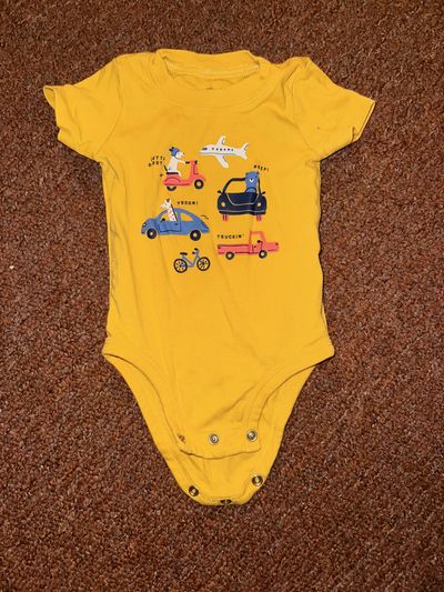 Carter's Yellow travel short sleeve onesie 9 Months